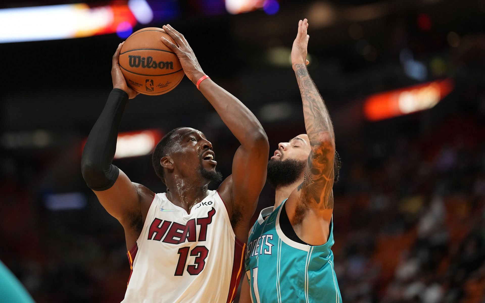 Bam Adebayo attempts to finish through contact