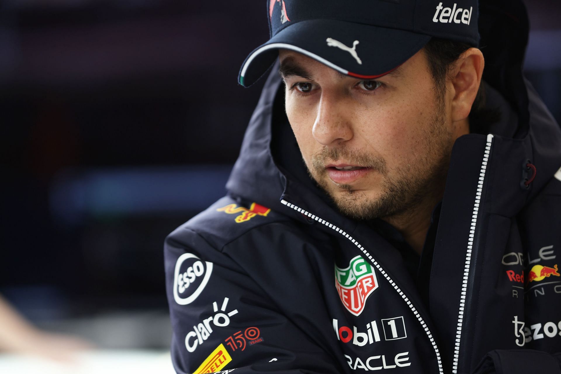 Sergio Perez of Red Bull Racing looks on in the garage during Day 1 of the 2022 F1 pre-season test in Barcelona, Spain (Photo by Mark Thompson/Getty Images)