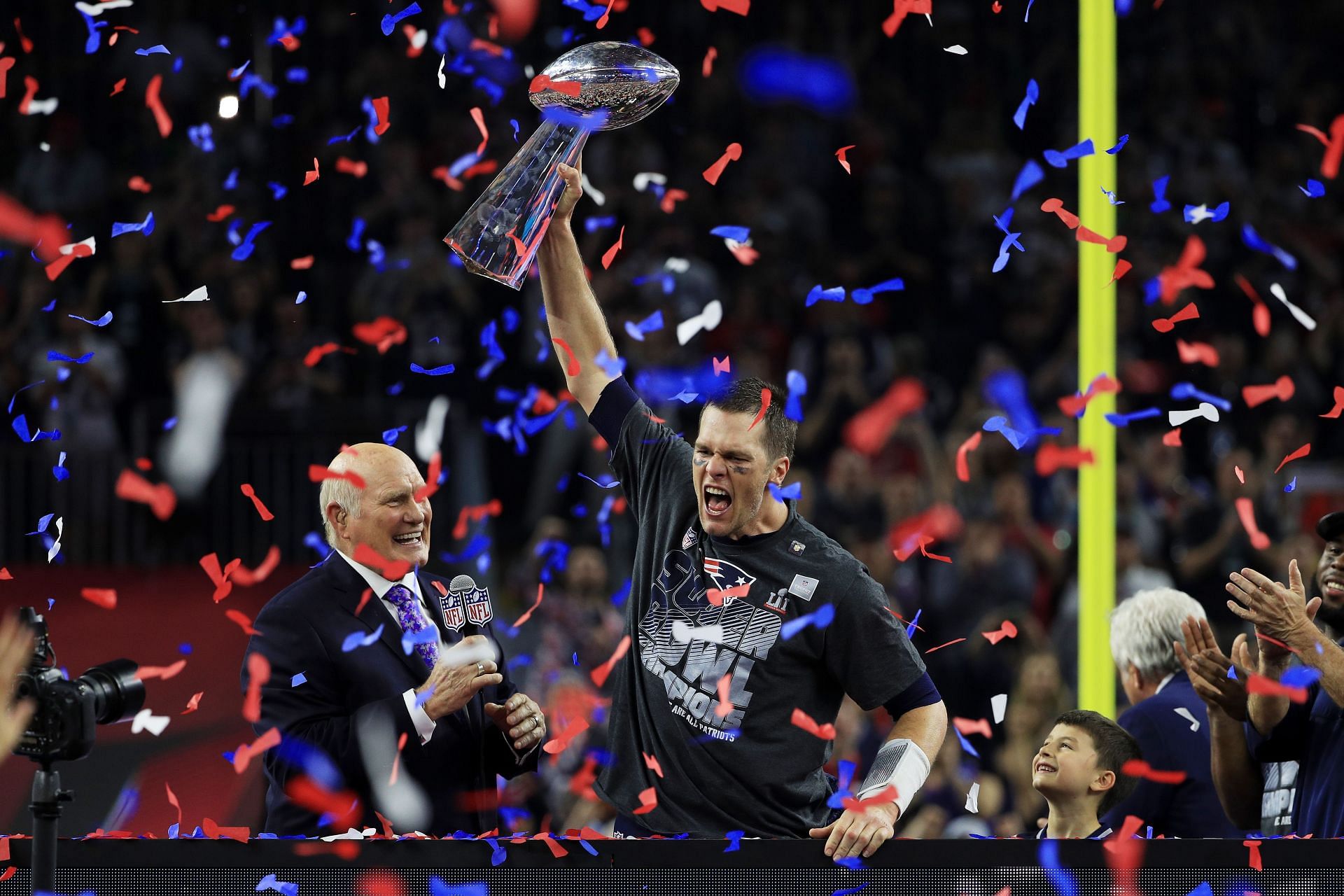 Tom Brady lifting the Vince Lombardi trophy after Super Bowl LI