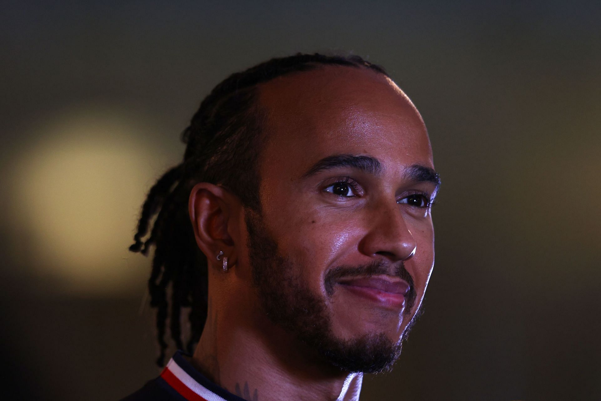 Lewis Hamilton talks to the media in the Paddock in Abu Dhabi, United Arab Emirates. (Photo by Bryn Lennon/Getty Images)