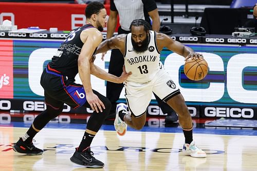 James Harden of the Brooklyn Nets drives against Ben Simmons of the Philadelphia 76ers on Feb. 6, 2021, in Philadelphia, Pennsylvania.