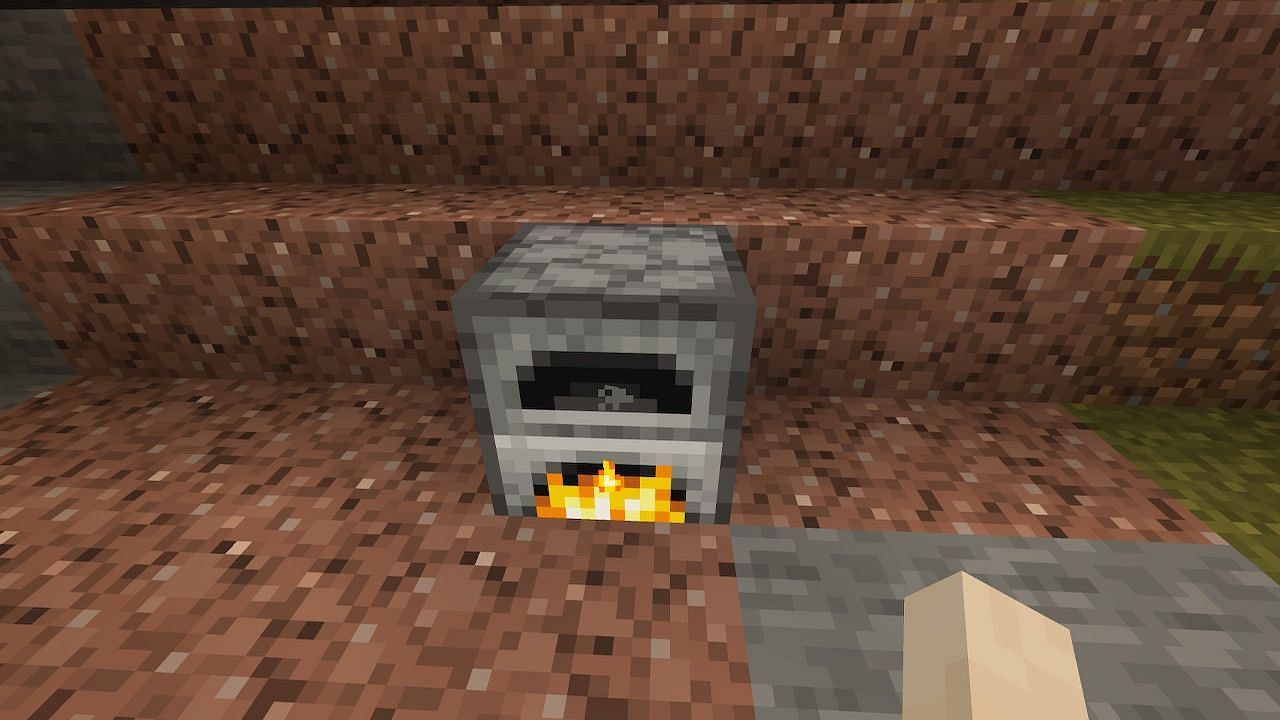 A furnace provides enough light to help keep the mobs from spawning. (Image via Minecraft)