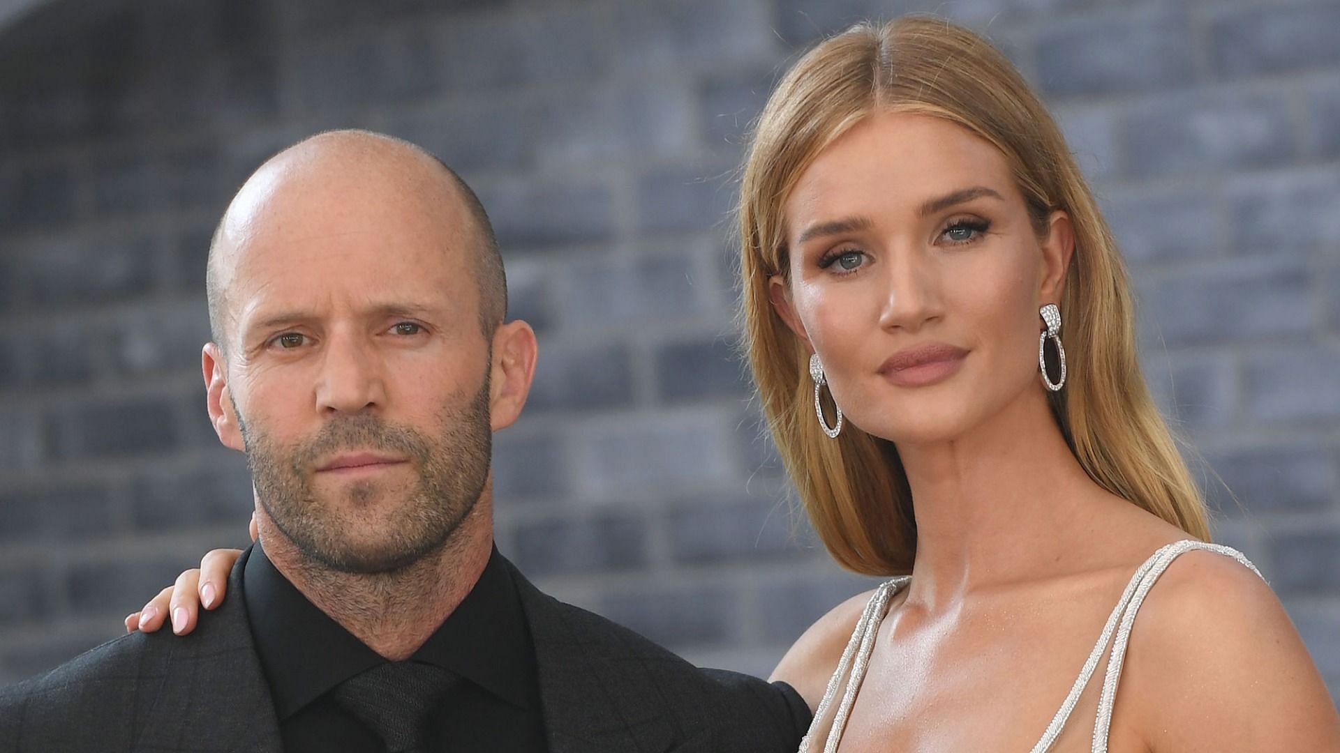 Huntington-Whiteley and Statham started dating in 2010 (Image via Robyn Beck/AFP/Getty Images)