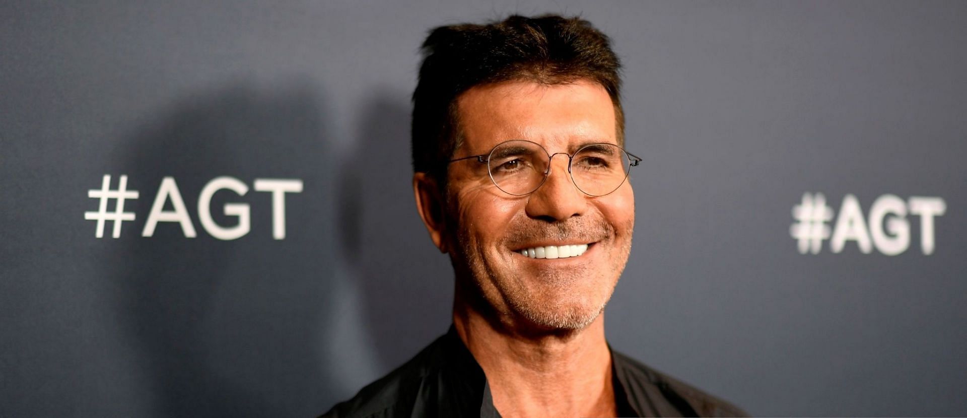 Simon Cowell reportedly had a broken arm after suffering an e-bike accident in London (Image via Frazer Harrison/Getty Images)