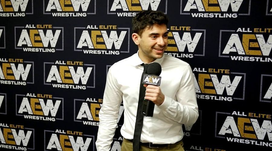 AEW President Tony Khan answers questions from the media after an event