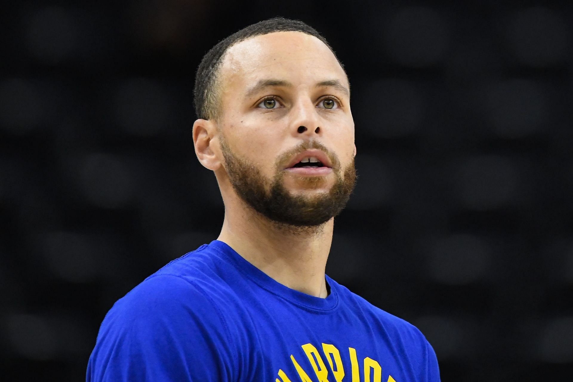 Steph Curry of the Golden State Warriors warms up before a game against the Utah Jazz on February 9 in Salt Lake City, Utah.
