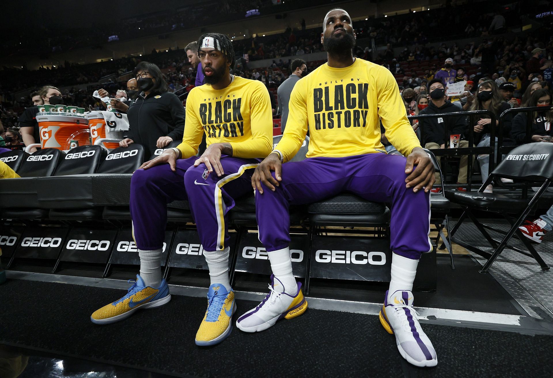 Anthony Davis (left) and LeBron James of the LA Lakers sit on the bench.