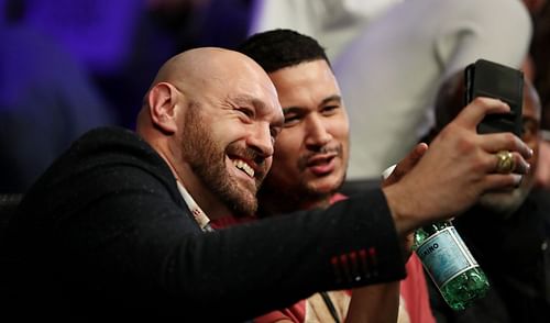 Tyson Fury (left) has announced he's going off social media for now.