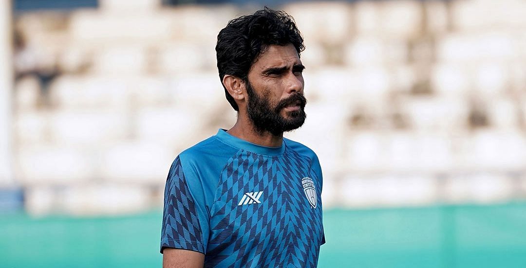 Khalid Jamil looks on as the NorthEast United FC players train. (Image Courtesy: Twitter/NEUtdFC)