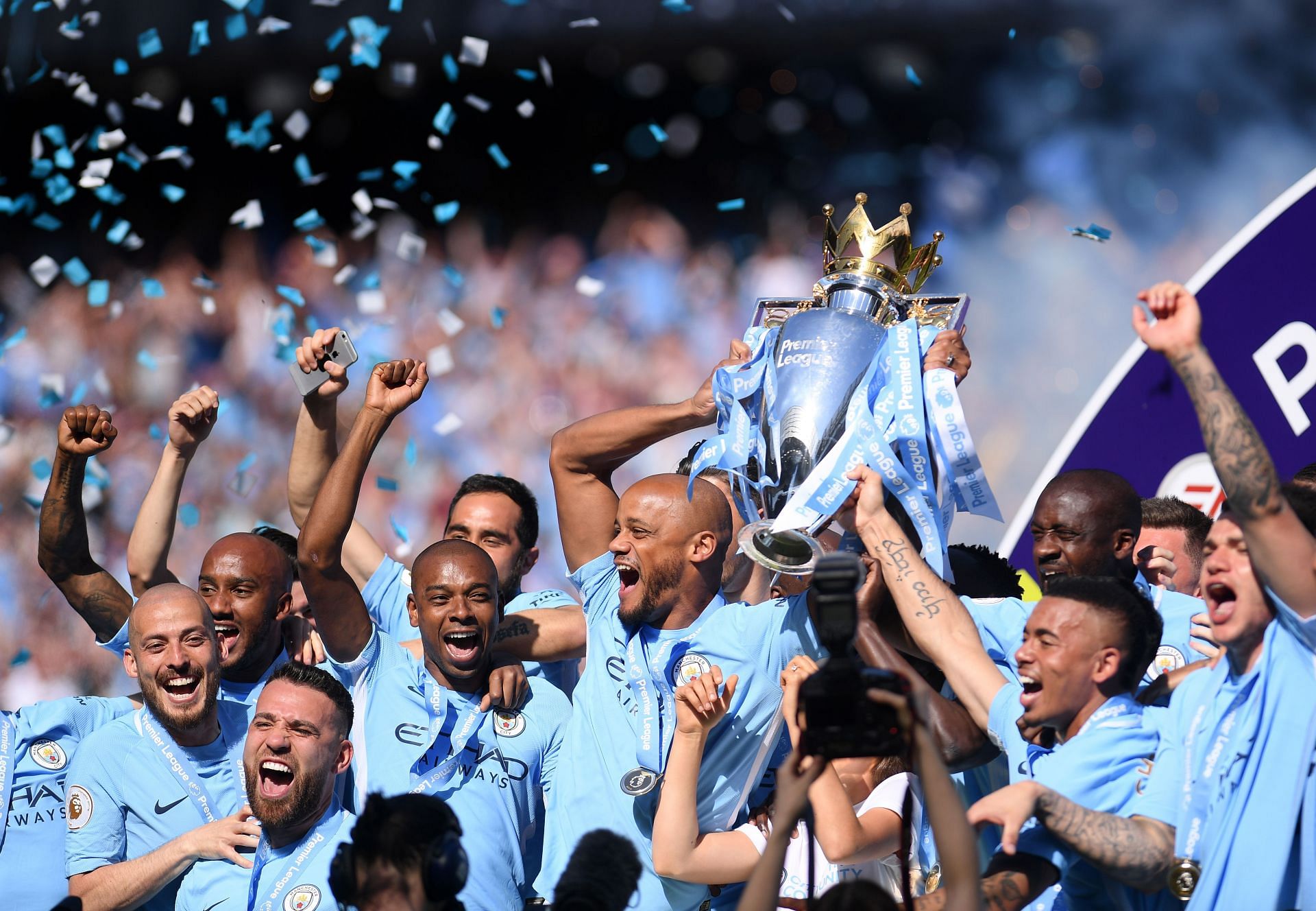 Manchester City players celebrating a historic 2017-18 season