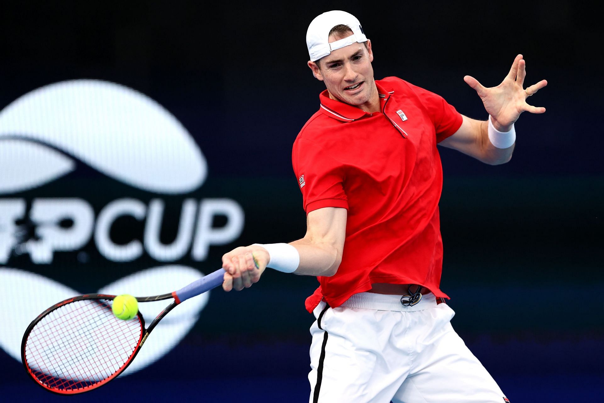Isner in action at 2022 ATP Cup.
