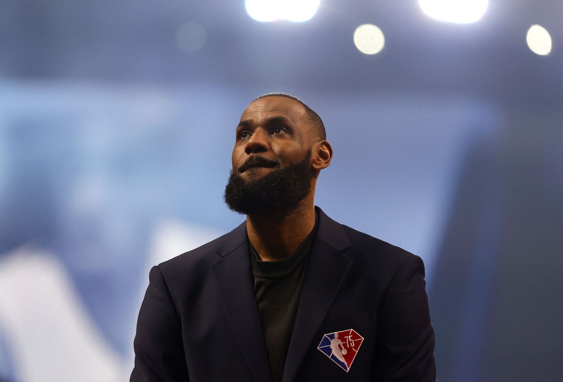 LeBron James reacts after being introduced as part of the NBA 75th Anniversary Team during the NBA All-Star Game at Rocket Mortgage Fieldhouse on Sunday in Cleveland, Ohio.