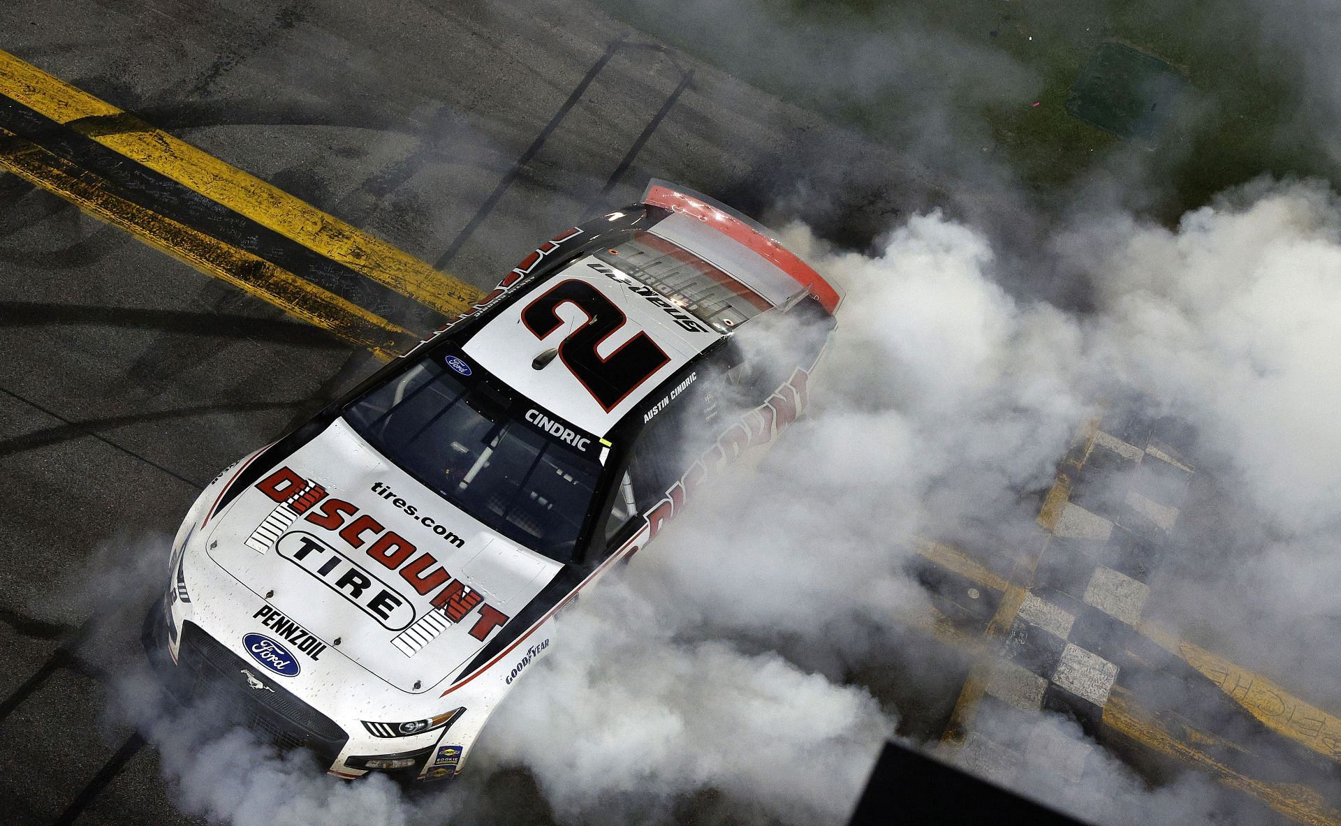 Austin Cindric celebrates his maiden NASCAR Cup Series Annual Daytona 500 win (Photo by Sean Gardner/Getty Images)