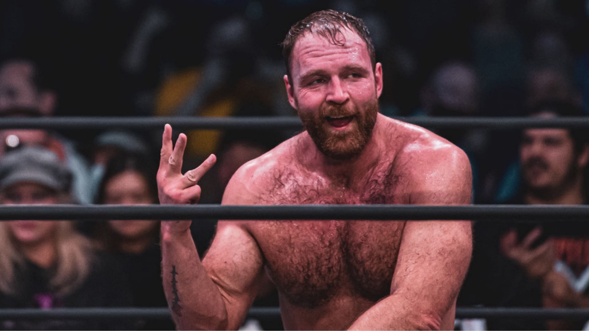 Jon Moxley posing after a match in 2022