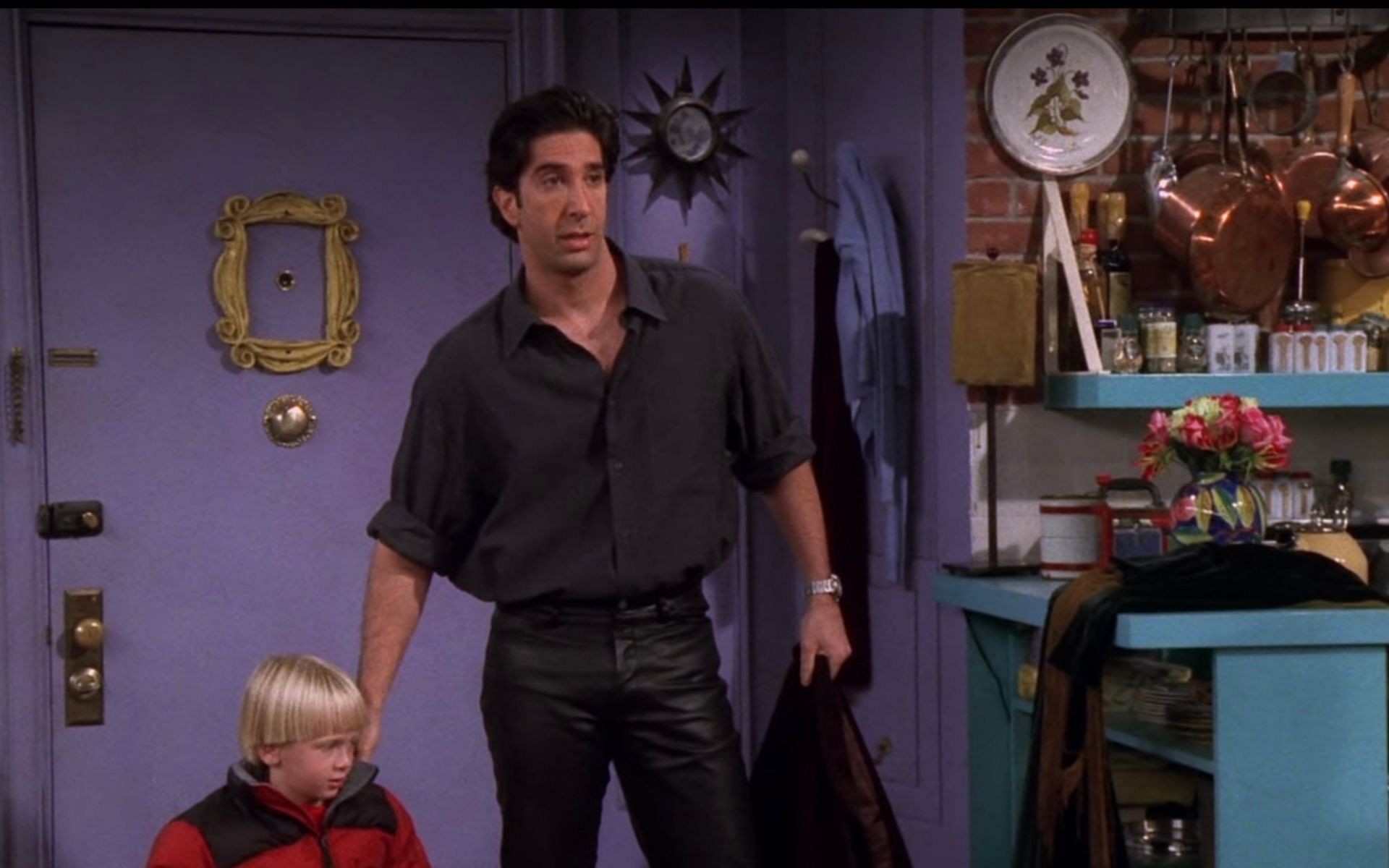 Ross Geller in leather pants and a black shirt (Image via Netflix)