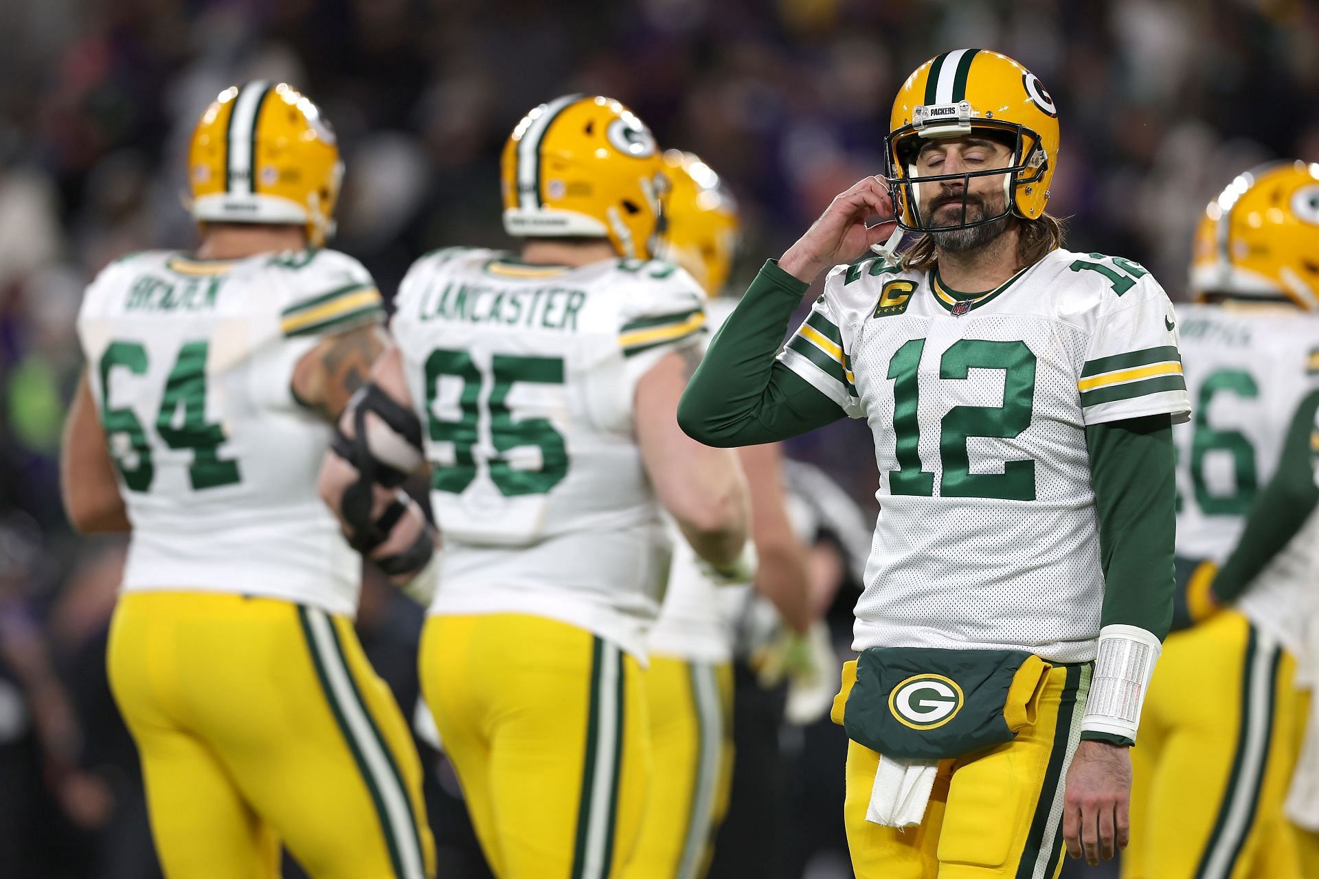 Green Bay Packers quarterback Aaron Rodgers takes the field