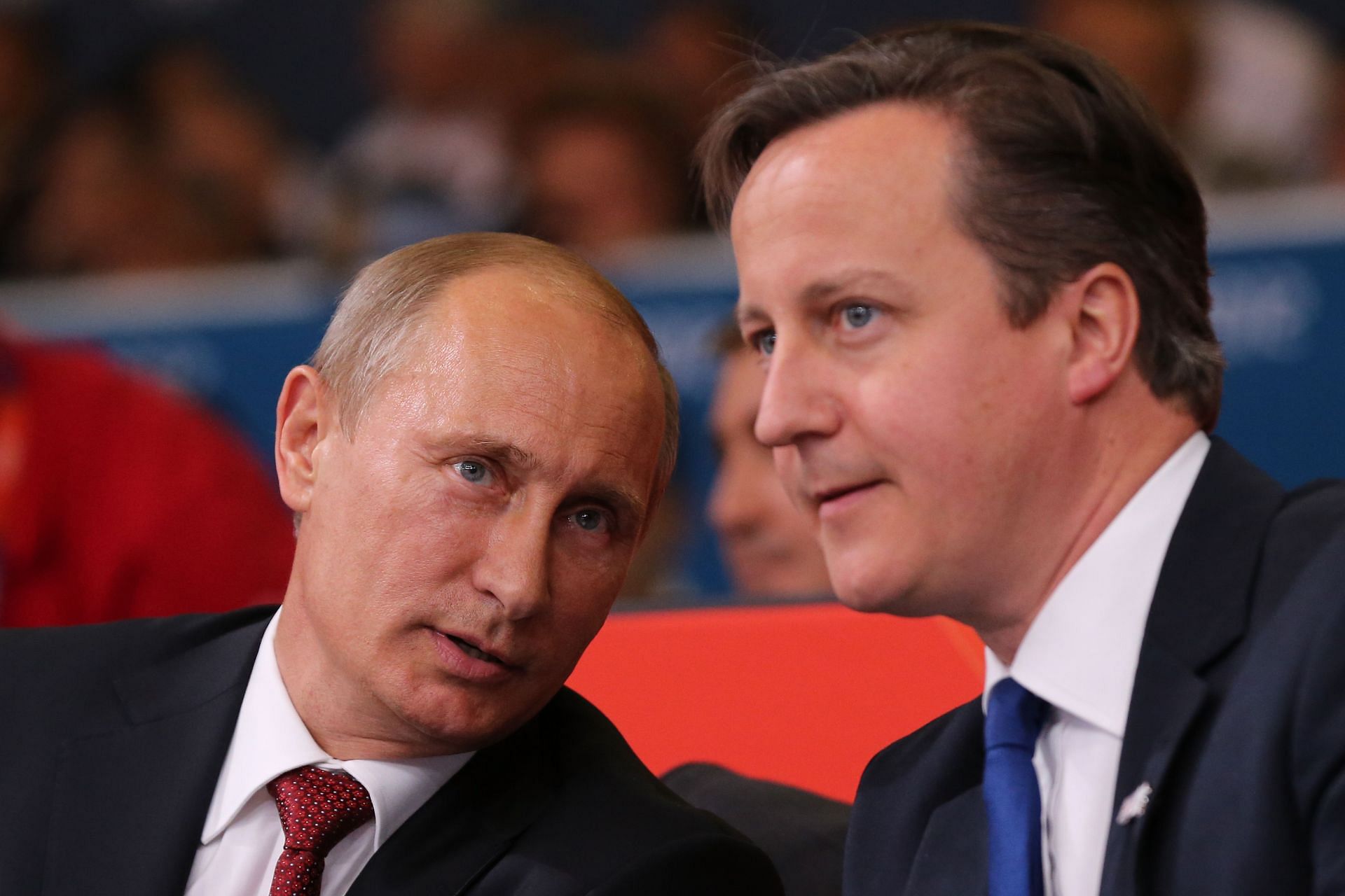 Russian President Vladimir Putin (L) at the judo competition with former British PM David Cameron at 2012 London Olympics (Getty Images)