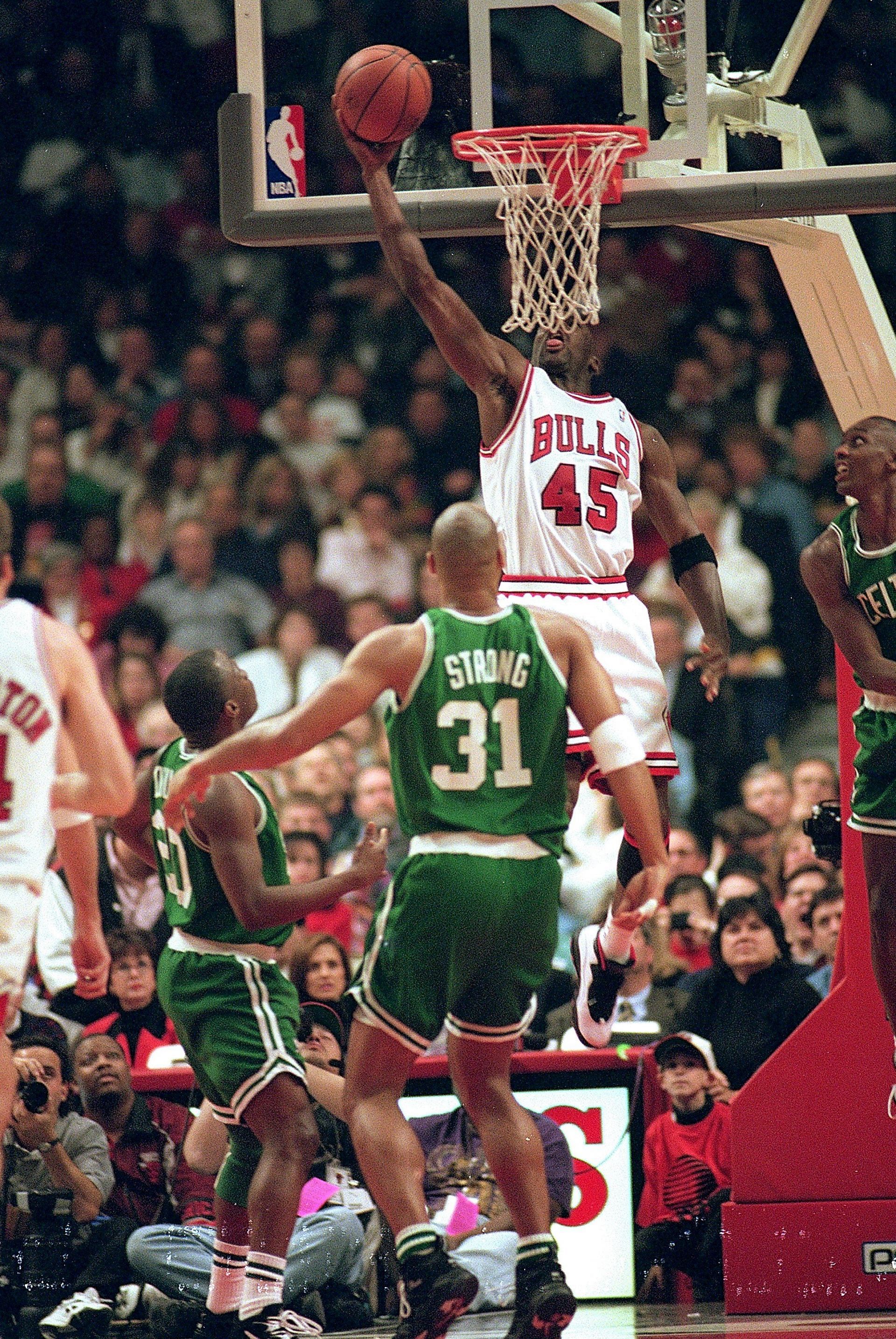 Michael Jordan #45 in action against the Boston Celtics