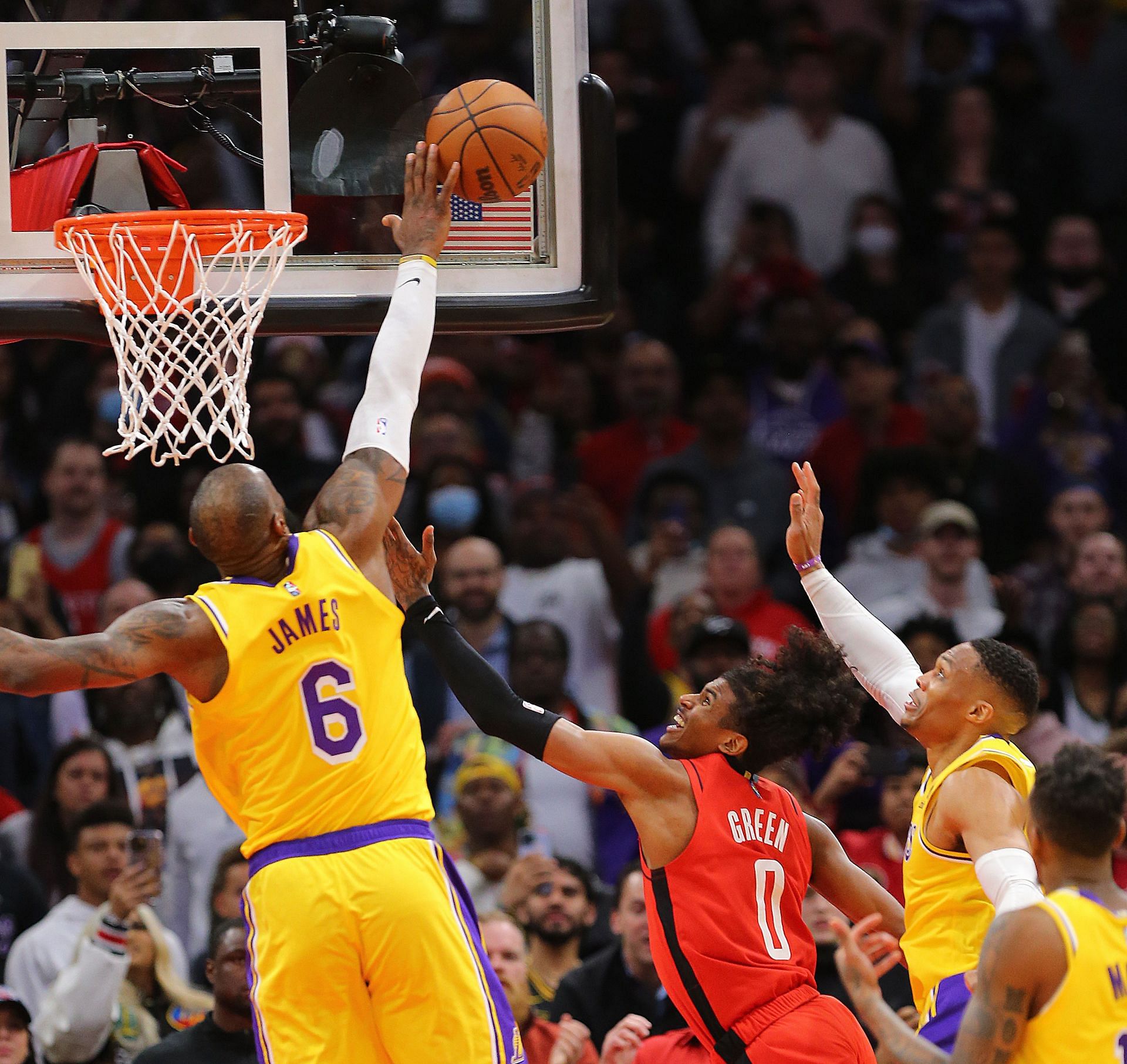 Jalen Green of the Houston Rockets has his shot blocked by LeBron James of the LA Lakers.