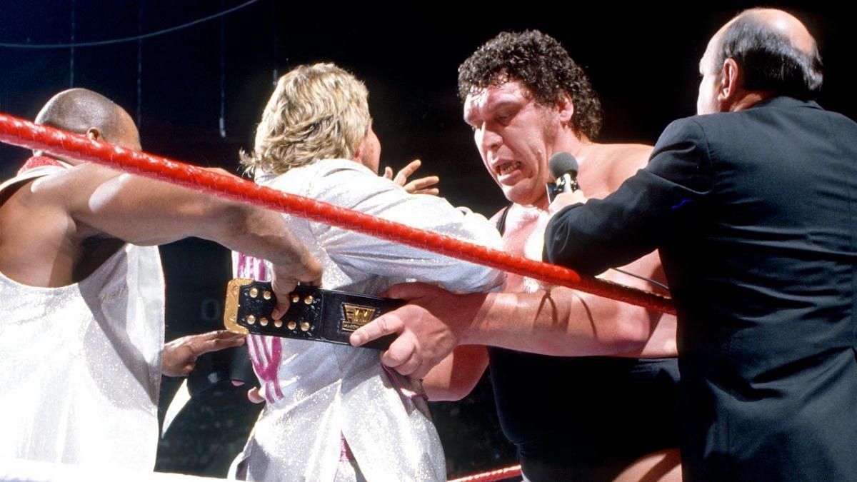 Andre The Giant wraps the WWE Championship around The Million Dollar Man&#039;s waist