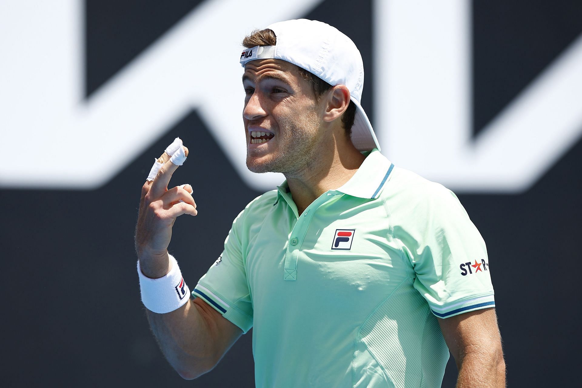Diego Schwartzman gestures during a match at the 2022 Australian Open