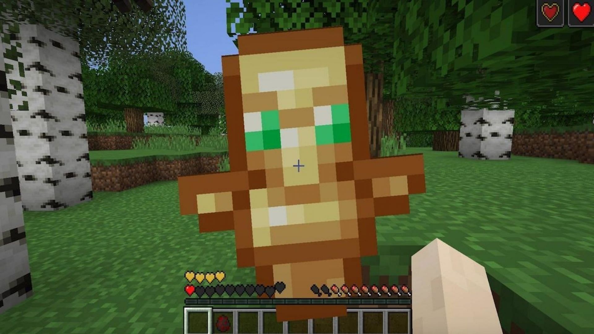 A player is saved in a forest by the totem (Image via Mojang)