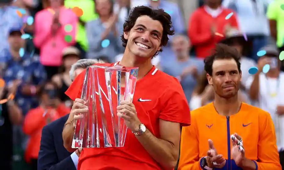 Taylor Fritz poses with the Indian Wells Masters trophy Rafael Nadal&#039;s forehand was inconsistent today