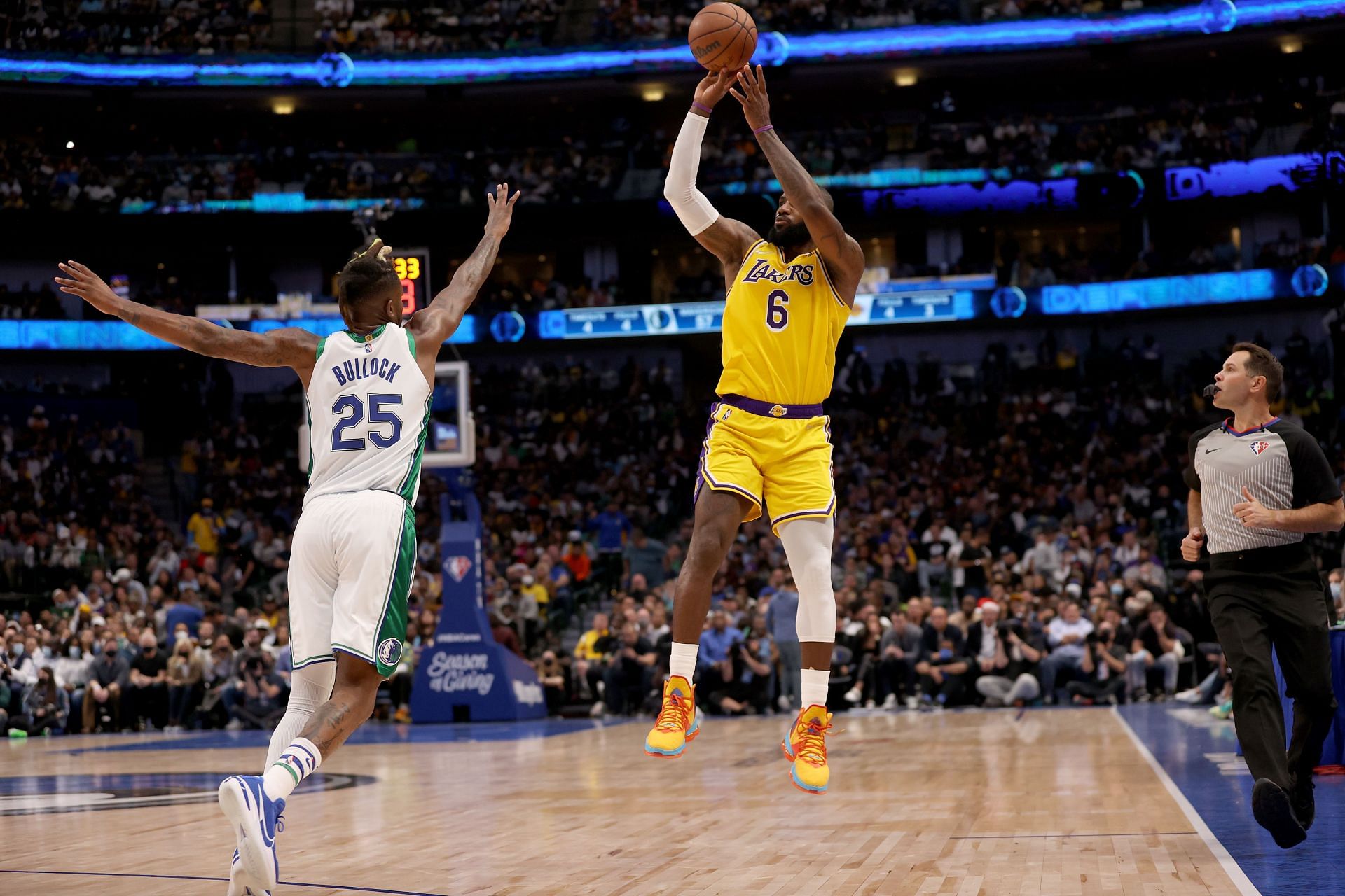LeBron James takes a shot during an LA Lakers encounter with the Dallas Mavericks