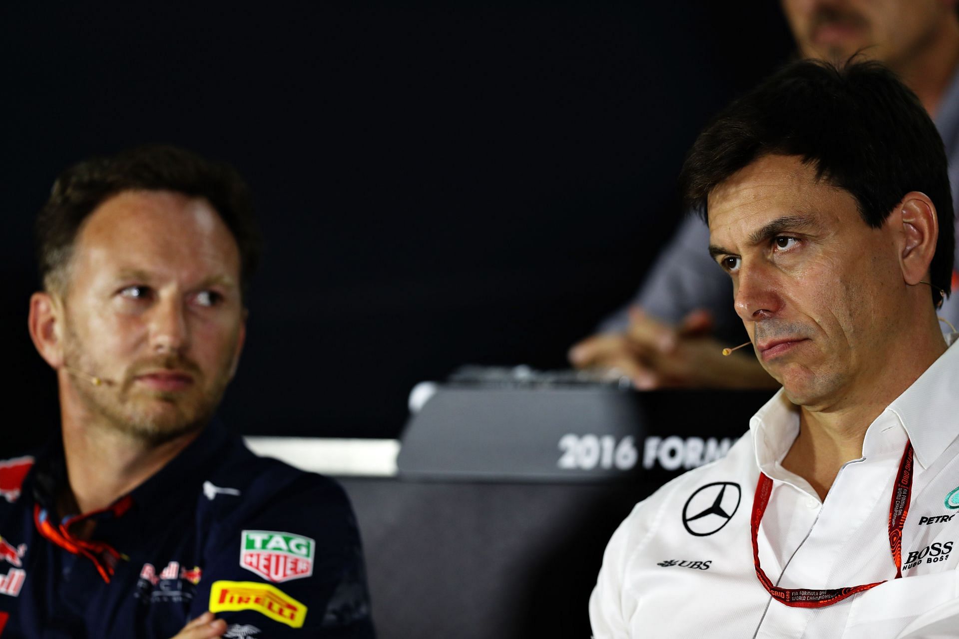 Red Bull boss Christian Horner (left) and Mercedes boss Toto Wolff (right) during the 2016 Singapore Grand Prix (Photo by Mark Thompson/Getty Images)