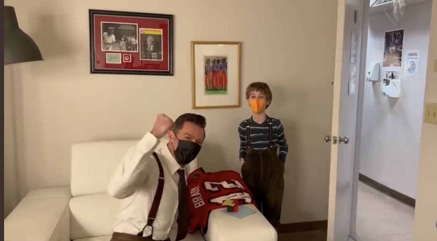 Jackman with Pasek and his autographed Tom Brady Tampa Bay jersey. Source: Instagram