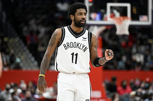 Kyrie Irving #11 of the Brooklyn Nets gestures during the second quarter against the Washington Wizards at Capital One Arena on February 10, 2022 in Washington, DC