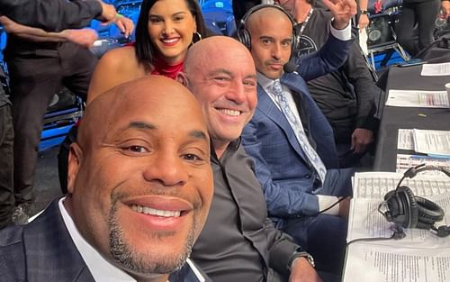 Daniel Cormier with Joe Rogan, Jon Anik, and Megan Olivi [Photo credit: @dc_mma on Instagram]