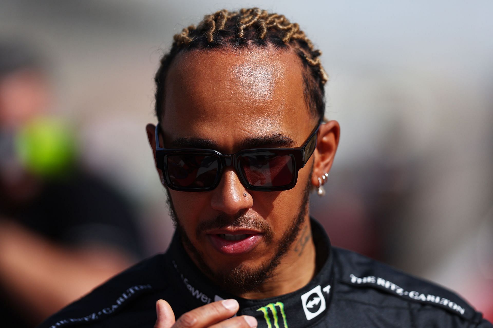 Lewis Hamilton in the F1 paddock in Bahrain (Photo by Lars Baron/Getty Images)
