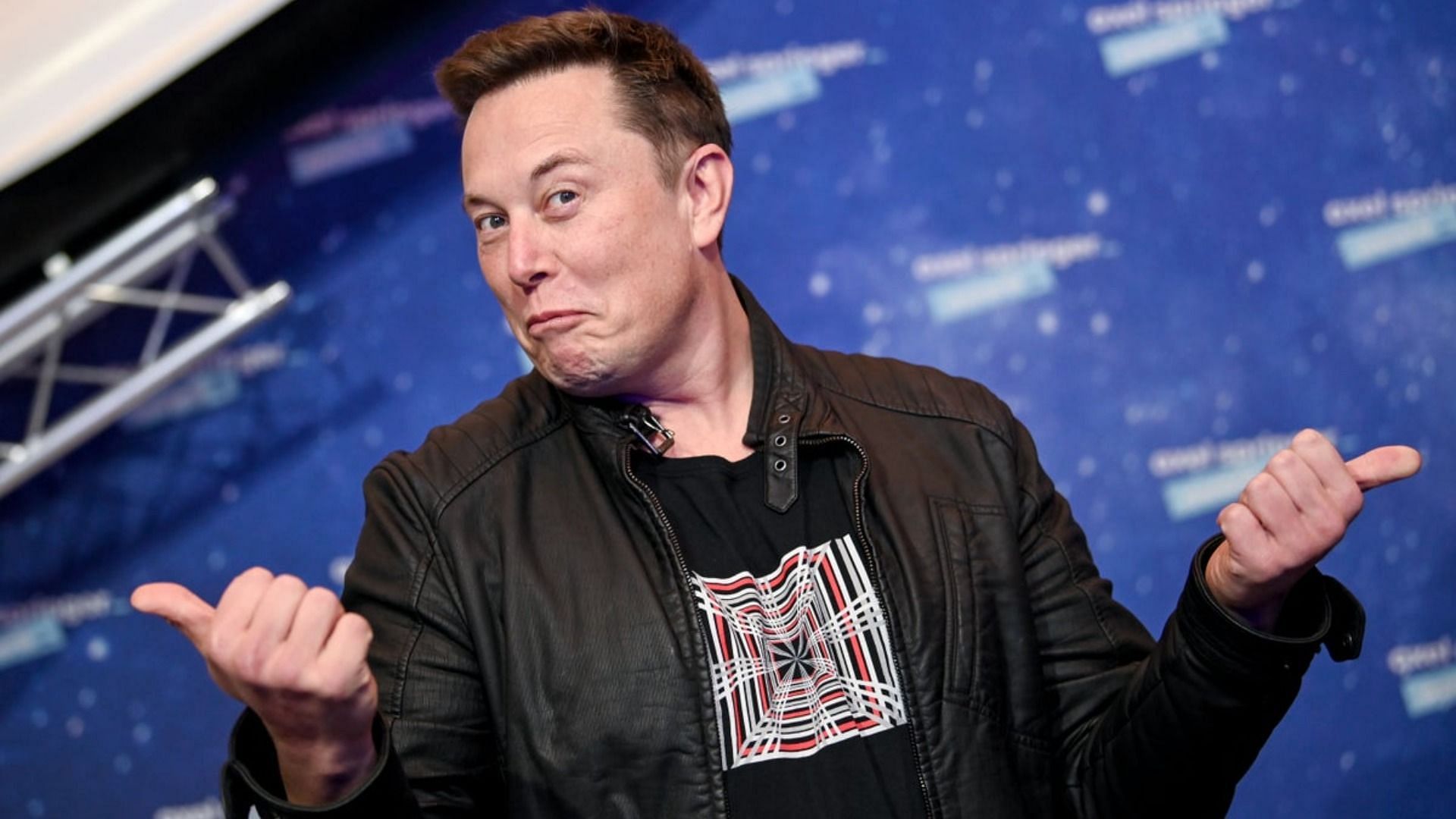 Elon Musk showed off his dance moves at the new factory opening ceremony in Europe (Image via Britta Pedersen/Getty Images)