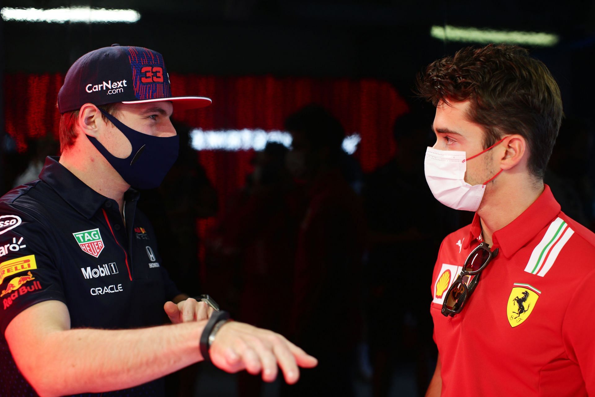 Max Verstappen (left) and Charles Leclerc (right) chatting in the F1 paddock  (Photo by Peter Fox/Getty Images)