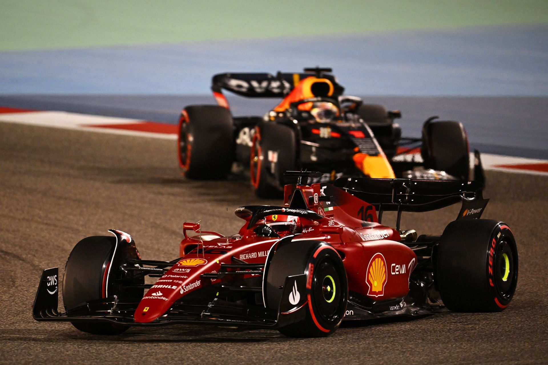 Ferrari&#039;s Charles Leclerc (foreground) tussles with Red Bull&#039;s Max Verstappen (background) during the 2022 F1 Bahrain GP (Photo by Clive Mason/Getty Images)