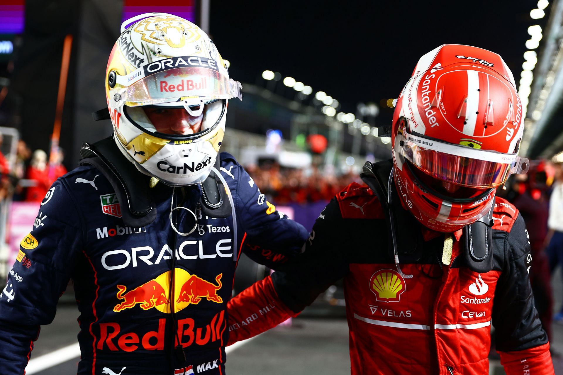 Red Bull&#039;s Max Verstappen (left) and Ferrari&#039;s Charles Leclerc (right) after the 2022 F1 Saudi Arabian GP (Photo by Mark Thompson/Getty Images)