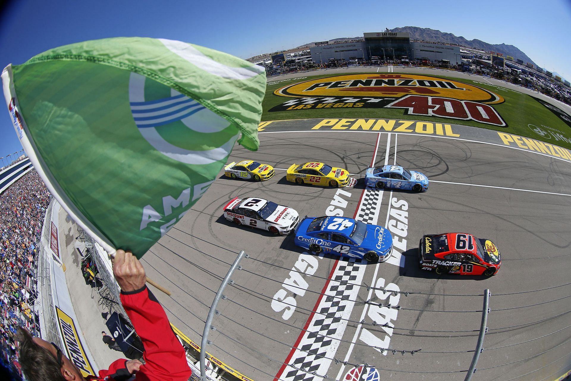 Martin Truex Jr. (#19) takes the green flag to start the 2020 NASCAR Cup Series Pennzoil 400 at Las Vegas Motor Speedway (Photo by Jonathan Ferrey/Getty Images)