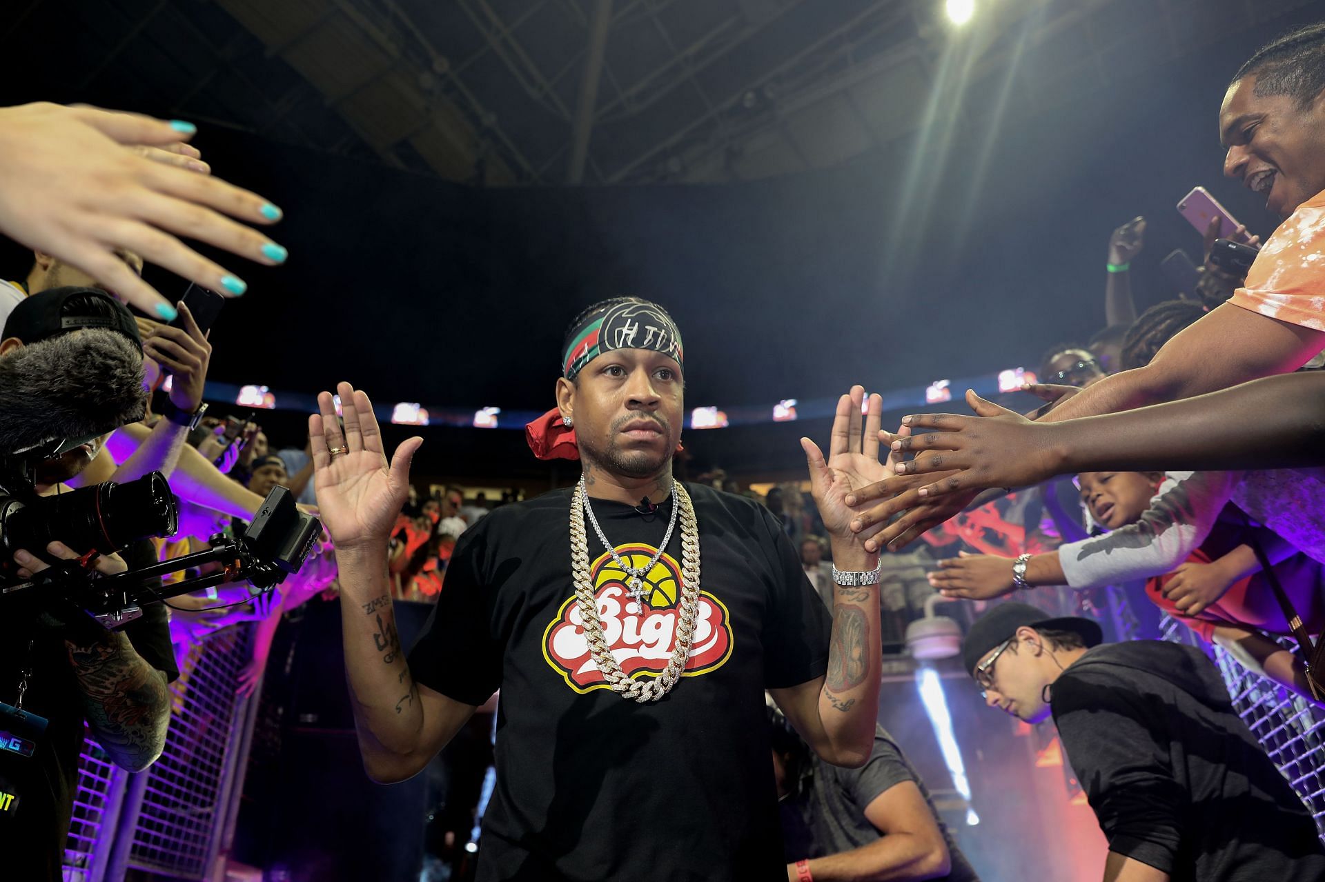 Allen Iverson #3 of the 3&Otilde;s Company high fives fans while being introduced in week nine of the BIG3 three-on-three basketball league at KeyArena on August 20, 2017 in Seattle, Washington.