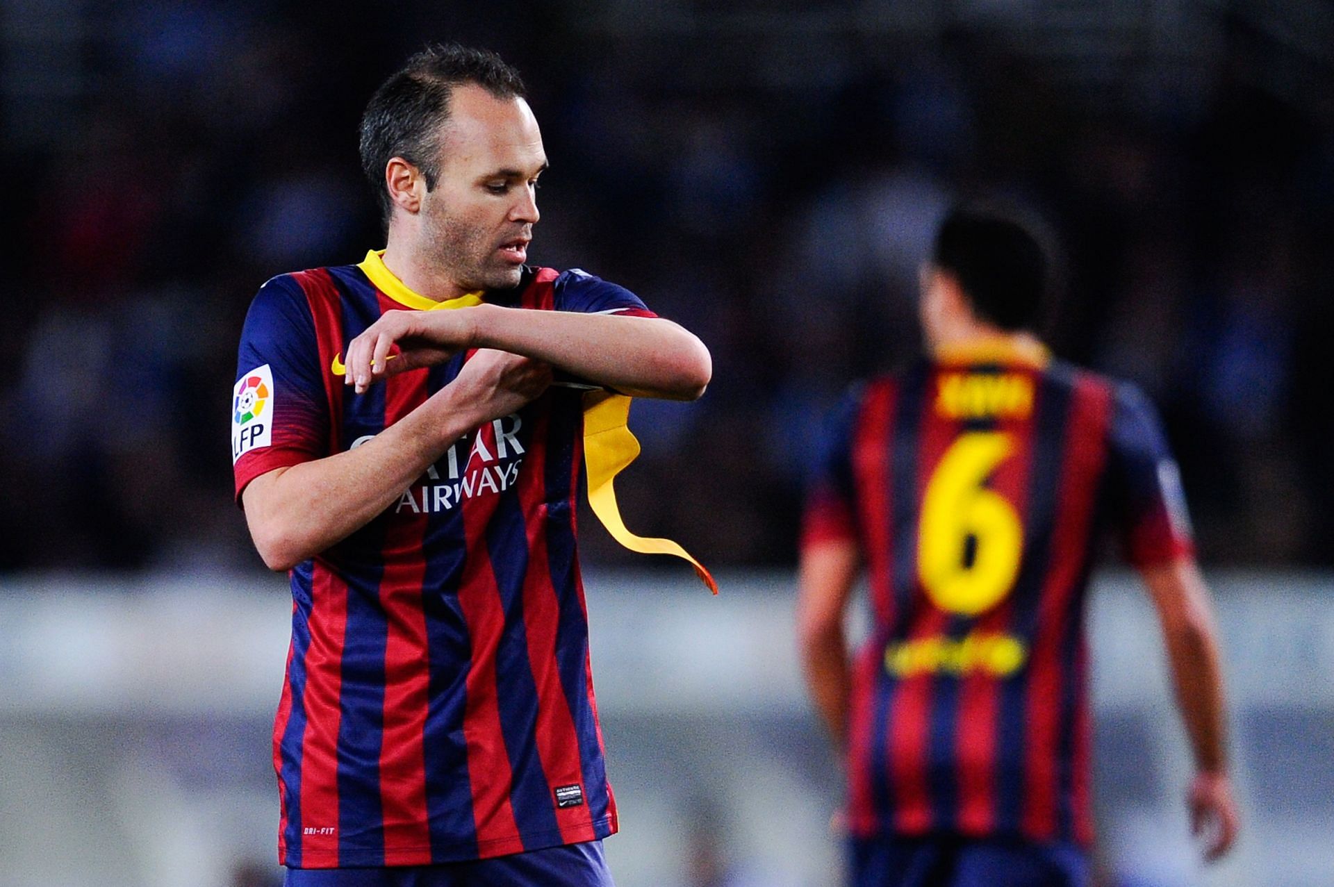 Barcelona have been home to some of the greatest midfielders of all time, including Iniesta (left) and Xavi (#6).