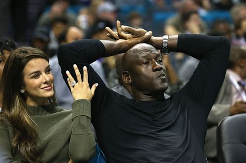 Michael Jordan watching his Charlotte Hornets