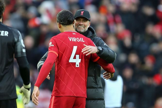 Liverpool pile pressure on Manchester City in title race after edging West Ham