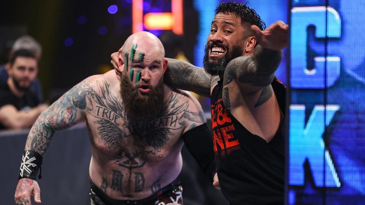 The Usos retained their titles.