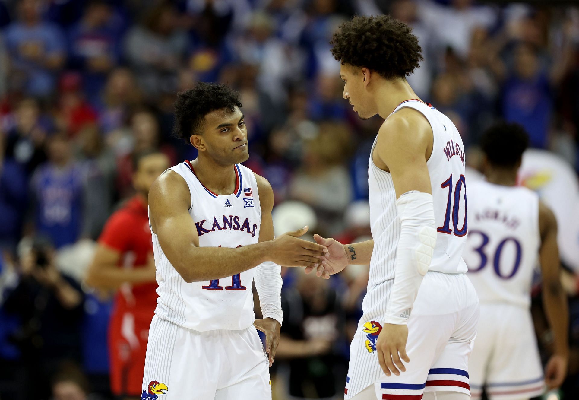 Kansas guards Agbajii, Martin withdraw from NBA draft