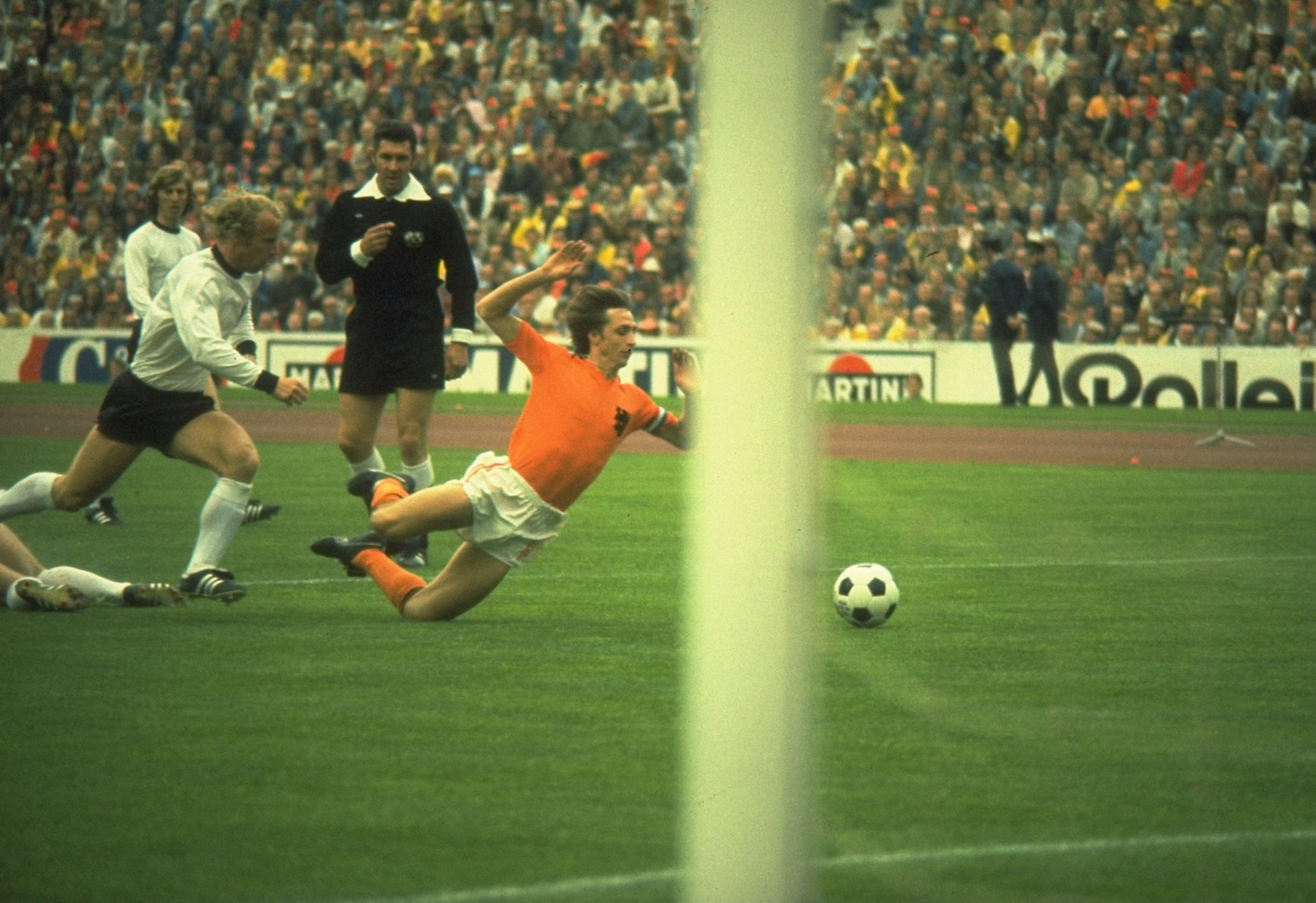 Johan Cryuff (orange) is famously brought down in the first minute of the 1974 FIFA World Cup final.
