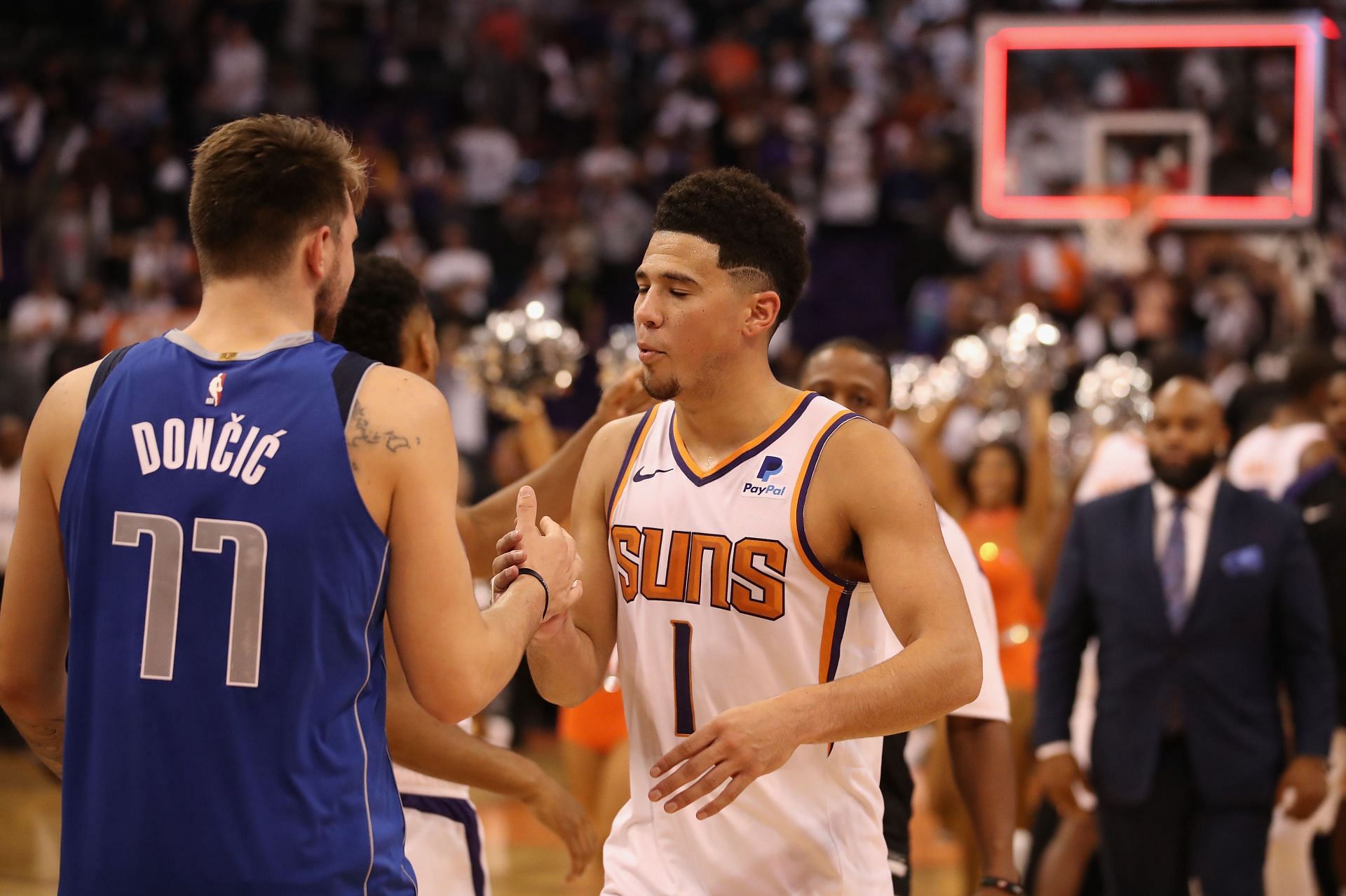 Devin Booker of the Phoenix Suns and Luka Doncic of the Dallas Mavericks