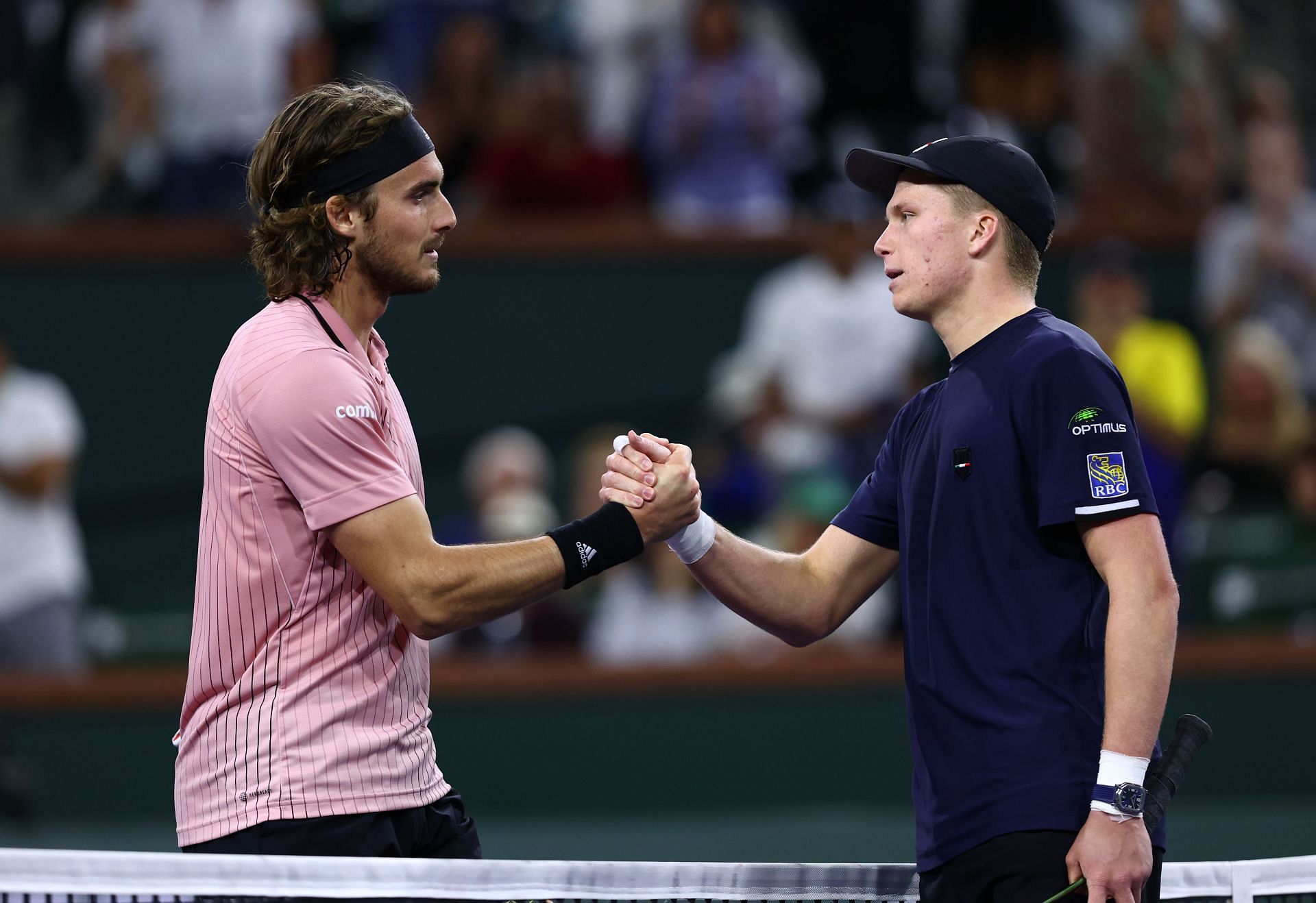 Stefanos Tsitsipas and Jenson Brooksby shake hands after their third round match in Indian Wells