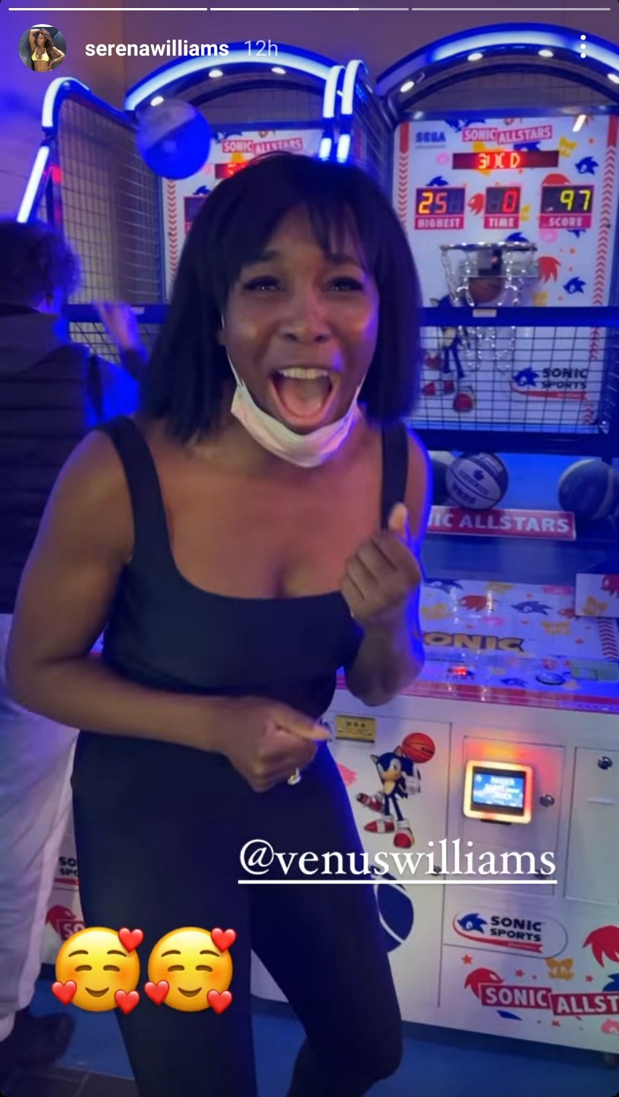 Venus rejoices after beating the previous highest score at the arcade