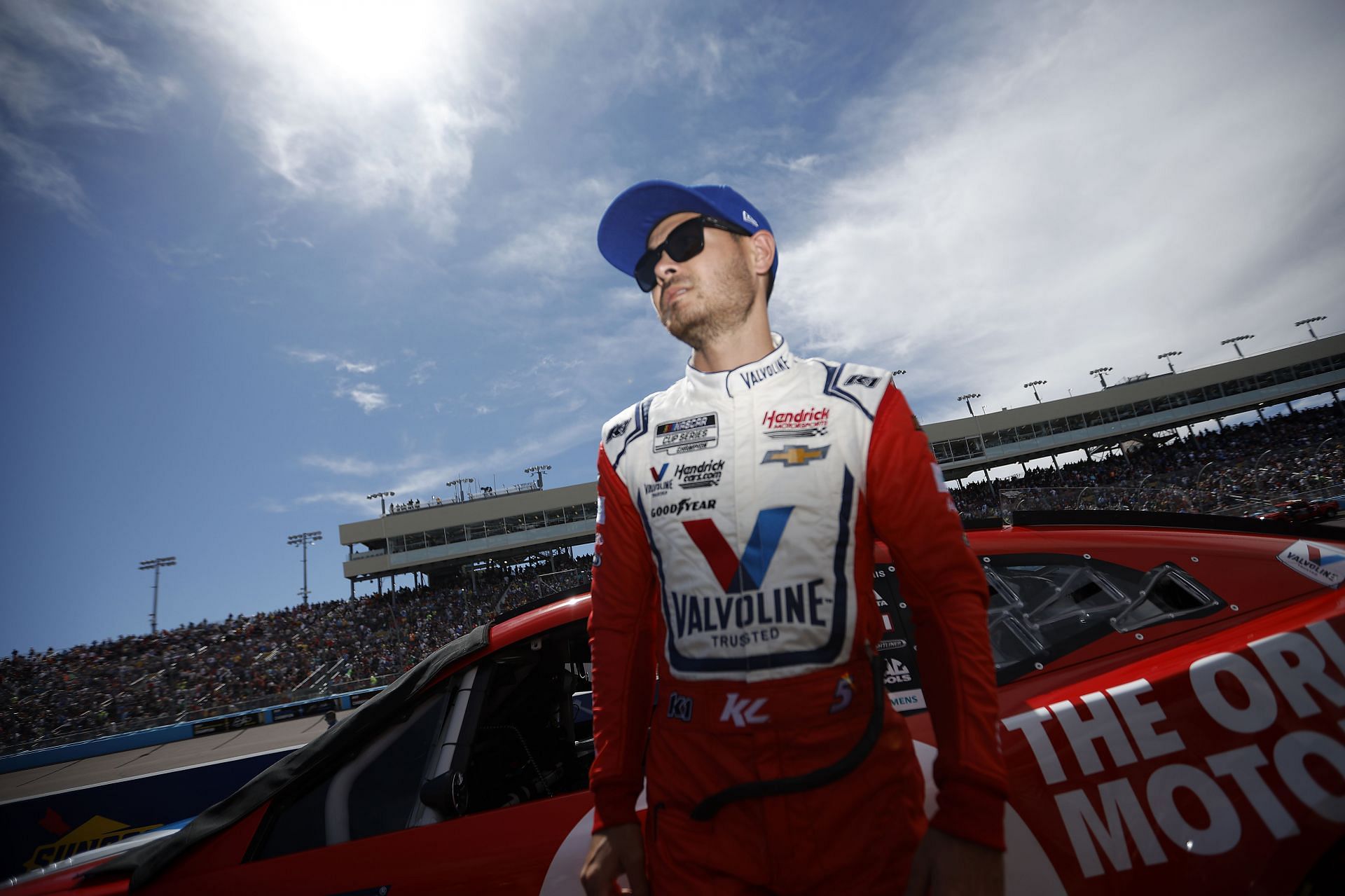Kyle Larson stands on the grid prior to the Ruoff Mortgage 500 during at Phoenix Raceway (Photo by Sean Gardner/Getty Images)