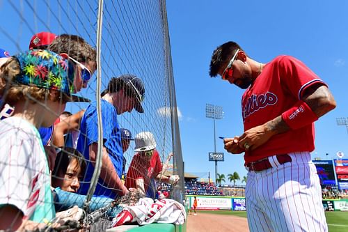 Nick Castellanos of the Philadelphia Phillies signing autographs, Spring Training 2022